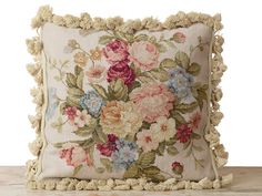 a pillow that has some flowers on it