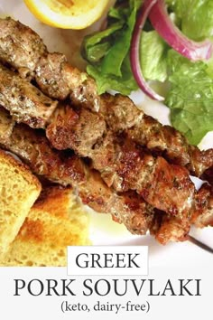 greek pork souvlakki with lettuce and lemon wedges on the side