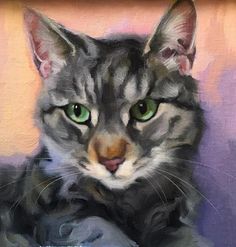 a painting of a grey cat with green eyes and whiskers on it's head