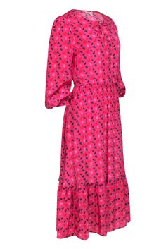 Get ready to bloom into the freshest spring wardrobe with this delightful Tuckernuck pink maxi dress. This playful stunner features a gorgeous print of pink, orange, and green florals that exude a joyful and vibrant energy. With its long sleeves and smocked waist, it effortlessly combines comfort and style. This dress is your go-to for embracing the spirit of spring and embracing the beauty of fresh blooms! Size L Shell 100% Silk Unlined Pullover Quarter button front Neckline tie Smocked waist L Pink Smocked Bodice Maxi Dress For Garden Party, Pink V-neck Dress With Elastic Waistband, Pink Midi Dress With Smocked Bodice, Flowy Maxi Dress For Spring Daywear, Pink Maxi Dress With Smocked Back For Garden Party, Pink Maxi Dress For Spring Beach Outings, Feminine Pink Fall Dress, Long Sleeve Summer Dresses With Rose Print, Pink Feminine Maxi Dress With Smocked Bodice