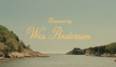 an image of the water with rocks and trees in the background that reads, directed by we's anderson