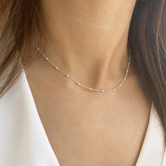 ✔️A satellite chain necklace that upgrades your everyday look.✔️ This satellite choker is great for wearing alone or for layering with other necklaces. It is the perfect gift for your girlfriend, sister, bridesmaids, or even yourself! >>IS IT A GIFT? This minimalist necklace comes in a beautiful gift package. If you wish to send a personal message, please make a comment at the checkout process! >>SIZE This beaded chain choker is available in length of 12, 13, 14, 15 , 16, 17, 18, 19 Minimalist Choker With Satellite Chain, Minimalist Satellite Chain Choker Jewelry, Minimalist Satellite Chain Choker, Minimalist Sterling Silver Choker With Delicate Chain, Minimalist Beaded Chain Choker For Gift, Minimalist Beaded Chain Choker As Gift, Minimalist Sterling Silver Choker For Everyday, Minimalist Everyday Choker With Delicate Chain, Minimalist Choker For Everyday Wear