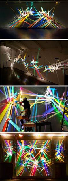 three different shots of the same person using lights to create an abstract art work on the wall