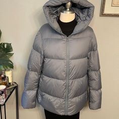 Uniqlo Down Blue/Gray Puffer Jacket. Oversized, Lightweight, Good For Layering - Size Small - Ultra Light Down - 90% Down, 10% Feathers Filling - Elastic At The Hem - Zip Closure + Snaps Approximate Measurements: Shoulder To Shoulder (Seam To Seam) - 17.5" Has Dropped Shoulder Sleeve Length - 24” Pit To Pit - 23" Length Center Back 26.5” Bottom Opening - 25 1/5" Functional Blue Nylon Puffer Jacket, Uniqlo Jackets, Grey Puffer Jacket, Blue Hooded Puffer Jacket With Double-lined Hood, Sporty Nylon Puffer Jacket With Double-lined Hood, Grey Puffer, Nylon Puffer Jacket With Double-lined Hood For Outdoor, Uniqlo Women, Long-sleeve Nylon Puffer Jacket With Double-lined Hood