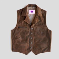 Handmade Men Hunt Club Leather Vest, Mens Motorcycle Leather Vest Brown Leather Men vest, Biker vest, Motorbike leather vest, Racer Vest "Unlock the Ultimate Shopping Experience! Discover the secret to exceptional style and unparalleled quality at UniqueAxBoutique With over 7 years of expertise, we're now bringing our passion online - just for you! Please note that the original product may slightly differ from the images shown, due to lighting effects and photography enhancements. * At UniqueAxB Leather Vest For Motorcycling, Fall Season, Leather Vest For Motorcycling In Fall, Classic Leather Vest For Biker Events, Rugged Leather Sleeveless Vest, Brown Biker Vest For Biker Events, Brown Biker Vest For Events, Fitted Brown Rugged Vest, Fitted Rugged Brown Vest, Fitted Leather Vest With Rugged Style