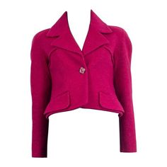 100% authentic Chanel 2018 cropped wool jacket in raspberry pink wool (67%) and cotton (33%). Comes with raglan sleeves (measurements taken from the neck) and two faux flap pockets on the front. Opens with a raspberry pink button on the front. Lined in silk (100%). Has been worn and is in excellent condition. Measurements Tag Size 36 Size XS Bust 84cm (32.8in) to 98cm (38.2in) Waist 82cm (32in) to 88cm (34.3in) Hips 88cm (34.3in) to 98cm (38.2in) Length 48cm (18.7in) Sleeve Length 67cm (26.1in) All our listings include only the listed item unless otherwise specified in the description above. Designer Pink Winter Blazer, Pink Fitted Cropped Jacket With Long Sleeves, Fitted Pink Cropped Jacket With Long Sleeves, Pink Fitted Long Sleeve Cropped Jacket, Fitted Pink Long Sleeve Cropped Jacket, Tailored Pink Wool Blazer, Classic Pink Wool Blazer, Pink Wool Blazer For Workwear, Pink Wool Blazer For Work