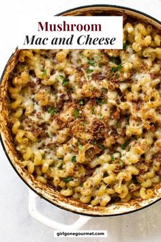 macaroni and cheese in a skillet with the words mushroom mac and cheese above it