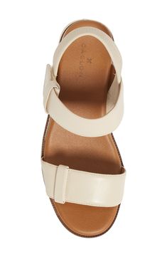 A lofty platform brings just-right height to an easygoing sandal perfect for any warm-weather occasion. 2 3/4" heel; 1 1/2" platform (size 8.5M) 3" strap height Adjustable ankle strap with hook-and-loop closure Leather upper and lining/rubber sole Imported Women's Shoes Sandal Women, Height Adjustable, Platform Sandals, Warm Weather, Women's Shoes, Nordstrom Rack, Ankle Strap, Womens Sandals, Baby Shoes