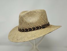 The stylish Alder is from Stetson's Outdoor Collection. Constructed of fine linen seagrass it has a 4" reinforced crown and a 3" (approx.) brim. Features include a UPF 50+ rating, UV underbrim, leather band w/braiding and Stetson side pin and a comfortable cotton sweatband. Approximate sizing guide: S - 6 7/8 to 7 M- 7 1/8  L- 7 1/4 to 7 3/8 XL - 7 1/2 to 7 5/8  The closer you are to the upper limit the better the fit.  Foam sizing tape is sent to help reduce the size if necessary. Outback Hat, Fine Linen, Hat Band, Summer Hats, Straw Hat, Leather Band, Cowboy Hats, Straw, Band