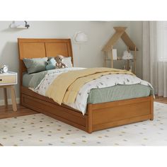 a bed with a teddy bear sitting on it's headboard and foot board