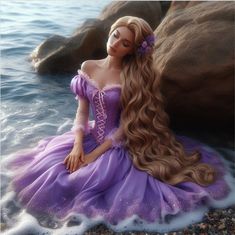 a barbie doll sitting on top of a beach next to the ocean wearing a purple dress