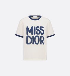 The T-shirt features the blue Miss Dior Graffiti motif, a nod to the 1967 debut ready-to-wear collection and a manifesto to Maria Grazia Chiuri's signature celebration of feminism. Crafted in white cotton and linen jersey, the classic crew-neck design is enhanced by contrasting trim. The T-shirt will complete a variety of outfits in any season and can be paired with other Miss Dior Graffiti creations.. XL Dior T Shirt, Denim Swimsuit, Dior Star, Icon Shoes, Maria Grazia Chiuri, Short Denim, Maria Grazia, Short T Shirt, Airport Fashion