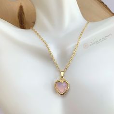 Light pink heart necklace, delicate pink pendant necklace, wifey necklace, gold short necklace, san valentine gift, mindfulness gift. Faceted light pink crystal pendant, gold plated mounted. This delicate heart pendant necklace is a lovely gift for your loved one. This necklace is perfect for any occasion, it is a simple piece but eye-catching. ♥ ITEM DETAILS: Total length of gold necklace: 16 inches. The length of the necklace refers to the total length from end-to-end. Pendant height: 1 inch. Gold Crystal Necklace For Valentine's Day Gift, Valentine's Day Gold Crystal Necklace Gift, Valentine's Day Gift Gold Crystal Necklace, Feminine Pink Crystal Necklace Gift, Feminine Pink Crystal Necklace As Gift, Pink Heart Charm Necklace For Mother's Day, Pink Gold Heart Charm Necklace For Gift, Pink Gold Heart Charm Necklace As Gift, Pink Pendant Crystal Necklaces For Valentine's Day