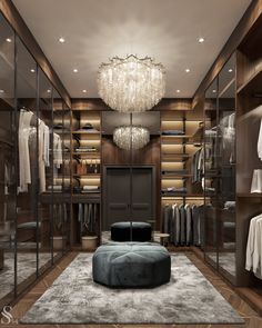 an image of a walk in closet with chandelier