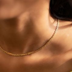 This shiny gold chain necklace from our signature O Collection, is made with the finest Italian Bismark chain. Pair it with other necklaces from this collection. Our patented connectors let you easily link and layer necklaces in any order you desire. Italian Bismark chain, width 2.3mm Adjustable chain: 15-17in (38-43cm) Gold Vermeil Spring clasp closure Hypoallergenic, lead and nickel free #028G Double Strand Gold Plated Figaro Chain Necklace, Gold Plated Double Strand Figaro Chain Necklace, Gold Double Strand Figaro Chain Necklace, Elegant Double Chain Cuban Link Necklace, Elegant Cuban Link Double Chain Necklace, Minimalist Gold Plated Cuban Link Chain Necklace, Gold Plated Double Chain Link Necklace, Timeless Chain Necklace With Delicate Rectangular Links, Gold Plated Chain Necklace With Delicate Rectangular Links