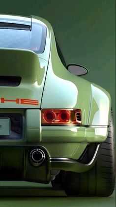 the rear end of a green sports car