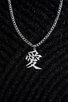 Materials: Stainless Steel. Comes with a 4mm curb chain. Pendant dimensions: Approx. 1.5" by 1". Necklaces For Boys, Accesorios Aesthetic, Masculine Jewelry, Mens Silver Jewelry, Double Layer Necklace, Guys Clothing Styles, Mens Fashion Streetwear, Meaning Of Love, Chain Pendant