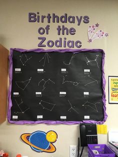 a blackboard with the words birthdays of the zodiac written on it in purple