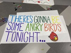 there is a sign on the floor that says there's gonna be some angry birds tonight