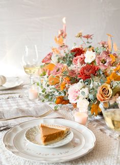 Warm, earthy tones of ivory, blush, dijon, and terracotta combine with varying natural textures to create a lush, autumnal arrangement. Please note, we will be replicating these product images as closely as possible, however exact stems in arrangements may vary. We will always honor the color palette and overall aesthetic of the arrangement. This year, we're offering our bespoke Thanksgiving centerpieces in our classic, white cylinder vase, as well as in two elegant new styles - a Footed Vase ce Flower Arranging Class, Classic Thanksgiving, Flower Truck, Flower Bar, Thanksgiving Centerpieces, Cylinder Vase, Oval Table Dining, Metal Trays, Vase Centerpieces