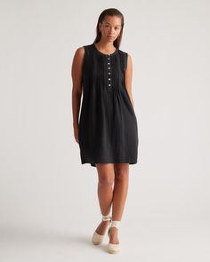 With an effortless look and flowy shape, our 100% Organic Cotton Gauze Sleeveless Swing Dress is a must-have for your warm-weather wardrobe. Made from soft, breathable organic cotton gauze, this sleeveless dress has a comfortably relaxed fit designed to keep you cool on even the hottest summer days. Bonus: it's got pockets!  | Quince | Women's Gauze Sleeveless Swing Dress in Black, Size XS, Organic Cotton Silk Pajamas Shorts, Silk Pajama Pants, Silk Tee, Sleeveless Linen Dress, Linen Collection, Cashmere Wrap, European Linens, Silk Tank, Shell Buttons