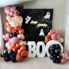 balloons are arranged in the shape of boo's and ghostes for a halloween party