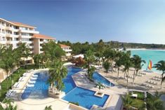 an aerial view of the resort and pool area