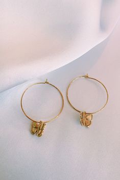 Beautiful 24k Gold Plated butterfly earrings! Available in hoops or hooks. Handmade with love <3 Gold Butterfly Hoop Earrings, Everyday Gold Butterfly-shaped Jewelry, Dainty Yellow Gold Earrings With Butterfly Charm, Butterfly Charm Huggie Earrings For Gifts, Hoop Earrings With Butterfly Charm For Gift, Dangle Hoop Earrings With Butterfly Charm As A Gift, Butterfly Charm Hoop Jewelry Gift, Adjustable Butterfly Gold Jewelry, Gold Dainty Hoop Earrings For Gift