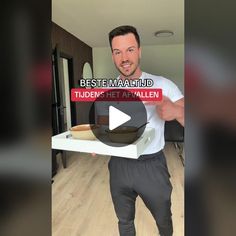 a man holding a tray with food on it and the caption reads best maanild