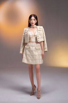 With a modern Western design, this blazer gives her a luxurious look like French girls. It has a beige tone with an emphasis on a unique material variation. Her sensuality is fully flaunted through the liberal and youthful cut-out of the design. You should combine three items coat-crop top-skirt to make the most accomplished set. Note:*Processing time takes 15-20 working days (including 12-15 working days for manufacturing and NOT including shipping time)**Made To Order Definition:- The product Thigh Length Skirt, Tweed Crop Top, Mean Blvd, Modern Western, Braided Line, French Girls, Western Design, Crop Top Skirt, Tweed Coat