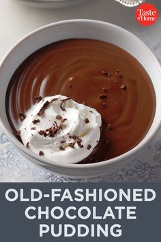 an old - fashioned chocolate pudding in a white bowl with whipped cream and chocolate shaving on top