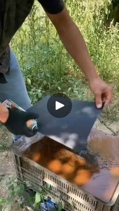 a man is using a tool to remove rust from an air conditioner