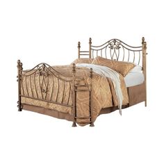 a metal bed frame with an intricate design on the headboard and foot board is shown