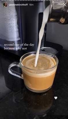 there is a cup of coffee that has milk pouring out of it and the caption reads, i second cup of the day because why not