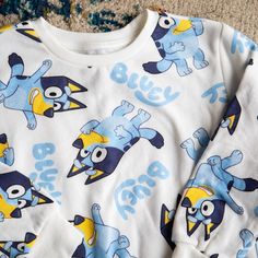 Nwot Bluey Long Sleeve, Crew Neck Sweatshirt. Lightweight With Banded Cuffs And Bottom, Features All Over Bluey Print. Super Cute For Any Bluey Fan! Unisex In Style, White In Color With All Over Character Print; Tag-Less. Never Worn, Tag Only Removed For Anticipated Wear But For Whatever Reason My Child Refused Every Time(?) Size: 4t Color: White With Blue/Yellow Character Print New - Never Worn Blue Cotton Sweatshirt With Character Print, Blue Character Print Hoodie Sweatshirt, Bluey T Shirt, Bluey Sweatshirts, Light Blue Crew Neck T-shirt With Character Print, Size 4t, Kids Shirts, Blue Yellow, Shirts Tops