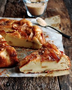 a piece of pie sitting on top of a wooden table