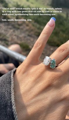 a woman's hand with two engagement rings on it and the caption reads, send message