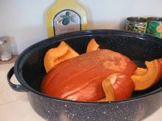 a hot dog in a pan on the stove