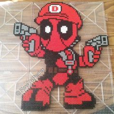 an image of a pixel art made to look like the character deadman from mario kart