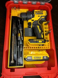 a tool box filled with tools on top of a table