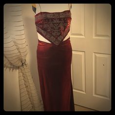 This Set Has A Nice Long Skirt In A Beautiful Deep Red Color With A Touch Of Shimmer To It. Slight V In The Waist, At The Center Of The Front And Back. Back Zipper For Easy On/Off. Top Is A Handkerchief Design Made From The Same Beautiful Deep Red Fabric As The Skirt. It Has Skinny Straps And Ties At The Back For Custom Fit. Skirt And Top Are Fully Line In A Black Fabric. The Top Is Embellished With Lots Of Iridescent Glass Bead Work. Say It Is Xl Size, But The Bottom Fits More Like A Large. Elegant Red Skirt For Night Out, Red Long Skirt Dress For Party, Red Long Skirt Party Dress, Elegant Red Evening Skirt, Red Long Skirt For Night Out, Red Satin Skirt For Formal Occasions, Red Satin Formal Skirt, Red Fitted Skirt For Evening, Elegant Red Skirt For Date Night