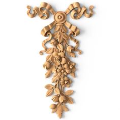 an intricately carved wooden wall hanging decoration