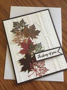 a close up of a greeting card with autumn leaves on it and the words thank you