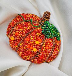 Pumpkin brooch, Handmade Beaded Gift. A beautiful and unusual brooch will decorate any of your clothes. This is a beautiful and interesting gift! Good mood will always be with you! Made with love. Be outstanding with Tamusia! Brooch Size: Width: 2.7 inch; Length: 2.3 inch Materials: Rhinestone crystal, Leather, Beads. Can be make in different colors. The brooch will be good packed! Will come to you in a gift box. Thank you that visited my shop, I will be glad you to see again in we wash shop! Fo Handmade Brooches For Halloween Gift, Unique Handmade Party Pins, Unique Beaded Brooches For Crafting, Pumpkin Brooch, Leather Beads, Halloween Beads, Brooch Handmade, Good Mood, Crystal Rhinestone