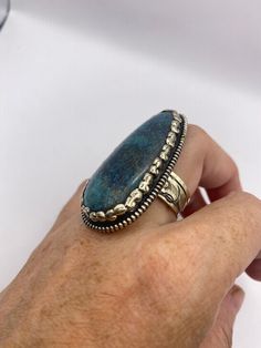 Large genuine blue Turquoise Vintage ring Low content silver not sterling. hand made repose on both sides. Huge stone over an inch long Can be adjusted 5-9 All rings are shipped free in the US in a nice gift box. Check out our over a THOUSAND great reviews!!! Engraving is $4 per letter and is not always perfect depending on the piece. It can take a few days if the jeweler is busy. This is payable to Paypal Judithsltd@gmail.com Blue Chrysocolla Turquoise Ring As Gift, Blue Chrysocolla Turquoise Ring For Gift, Blue Chrysocolla Turquoise Ring Gift, Blue Turquoise Ring With Chrysocolla As A Gift, Gift Blue Turquoise Chrysocolla Ring, Silver Chrysocolla Rings For Gift, Southwestern Blue Chrysocolla Rings, Adjustable Turquoise Ring In Sterling Silver For Healing, Blue Chrysocolla Jewelry With Large Stone