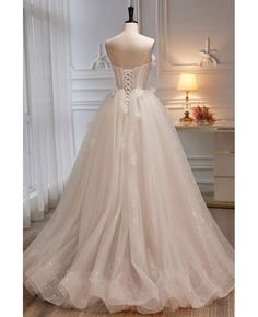 Get 10% off now! Buy beautiful long bling tulle ivory ballgown wedding dress with flowers at cheap price online. Free stable shipping and pro custom service since 2009. Cream Tulle Bridesmaid Wedding Dress, Cream Tulle Bridesmaid Dress, Cream Tulle Wedding Dress For Debutante Ball, Wedding Tulle Ball Gown With Sweep Train, Wedding Ball Gown With Sweep Train In Tulle, Quinceanera Wedding Dress With Tulle Skirt, Cream Tulle Ball Gown For Debutante Ball, Quinceanera Tulle Wedding Dress, Floor-length Tulle Wedding Dress For Bride