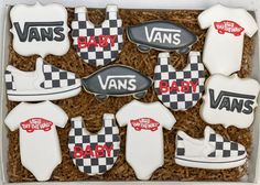 decorated cookies in a box with vans and baby ones