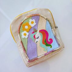 🦄 Magical Unicorn Bag for Little Dreamers! 🦄 Introducing the perfect bag for your little one's adventures! This handmade punch needle bag is not just a bag--it's a magical accessory that every preschooler will love! 🌟 ✨ Unicorn-Themed: Adorned with a whimsical unicorn design, this bag is sure to be your child's new favorite! 🎨 Handmade with Love: Crafted with care, each stitch is a testament to quality and uniqueness. 🎒 Perfect for Little Hands: Designed for preschoolers, it's the ideal siz Punch Needle Bag, Handmade Backpack, Unicorn Bag, Magical Accessories, Handmade Backpacks, Kids Backpack, Unicorn Lover, Unicorn Design, Etsy Personalized Gifts