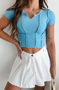 Exposed Seam Top, Light Blue Stretch Tops With Solid Color, Trendy Blue Ribbed T-shirt, Light Blue Stretch Ribbed Top, Light Blue Ribbed Stretch Top, Stretch Ribbed Light Blue Top, Light Blue Crew Neck Knit Top For Summer, Summer Light Blue Knit Top With Crew Neck, Summer Light Blue Crew Neck Knit Top