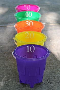 colorful plastic buckets with numbers on them